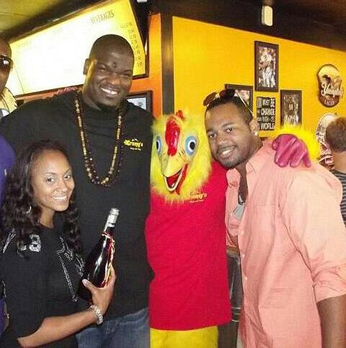 Aleviar and John Henderson with Crumpy the Chicken, a mascot for Big John's Crumpy's Wings &amp; Things, and a friend at the opening of the West Jacksonville location at 808 Edgewood Ave. N. The second location is expected to open this weekend at 4021...