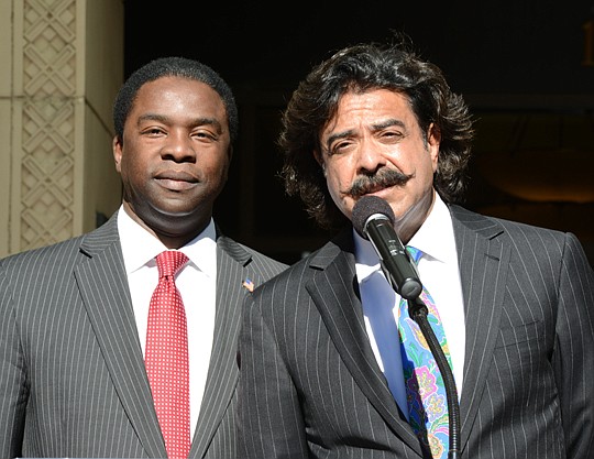 Photo provided by Tonya Austin - Jacksonville Jaguars owner Shad Khan and Mayor Alvin Brown on Saturday were part of a news conference announcing that SMG was the mayor's choice to run the City's sports and entertainment venues, including EverBank Fie...