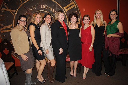 Photos by Joe Wilhelm Jr. - The Jacksonville Women Lawyers Association executive board (from left), Treasurer Zeina Salam of the Law Offices of Zeina Salam; Vice President of Events-Judicial Reception Erin Martin of Delta Settlements; Vice President o...