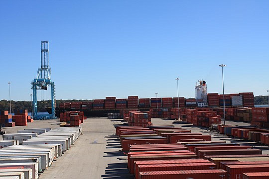 Photo by Joe Wilhelm Jr. - The collective bargaining agreement between the International Longshoremen's Association, which represents laborers who load and unload cargo ships around the world, and U.S. Maritime Alliance, which comprises container carr...