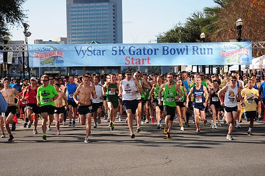 Photos special to the Daily Record - The annual VyStar 5K Gator Bowl Run is scheduled at 10 a.m. Monday at the Landing.