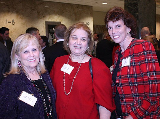 Photos by Joe Wilhelm Jr. - From left, Circuit Judges Mallory Cooper and Jean Johnson with Florida Coastal School of Law professor Lois Ragsdale at The JBA annual Bench and Bar holiday social Dec. 13.