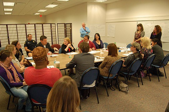 Photo by Max Marbut - Downtown Vision Inc.'s First Wednesday Art Walk Committee convened Thursday to explore ways to improve the monthly event.