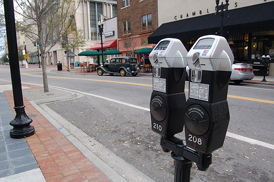 Photos by Max Marbut - Locating an available metered parking space Downtown along Laura Street will have a high-tech solution when the City tests a new parking guidance smartphone app system.