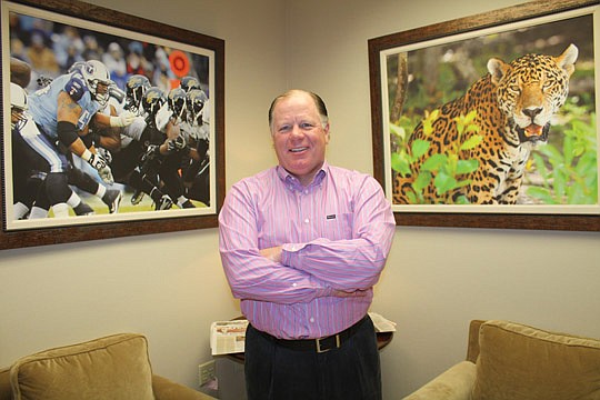 Photo by Joe Wilhelm Jr. - Jacksonville Jaguars President Mark Lamping is approaching one year with the organization and has settled into his office at EverBank Field. He was named president of the organization a year ago today. He estimates he spends...
