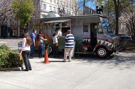 Photo by Max Marbut - The Gourmet Aviator food truck was in business Wednesday in the parking lot at Forsyth and Main streets. The location is regulated by the City's "Food Truck Area Program."