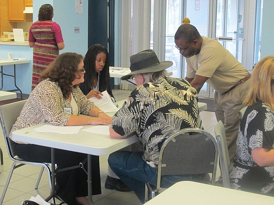 Area attorneys, paralegals and law students assisted area seniors with advance directive documents Feb. 23.