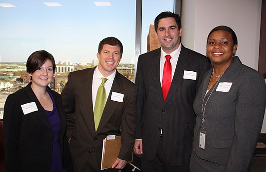 Photos by Joe Wilhelm Jr. - The Jacksonville Bar Association Young Lawyers Section Young Lawyers Breakfast hosted about 80 attorneys and 20 4th Circuit judges Thursday at the Duval County Courthouse. From left, attendees included attorneys BeJae Shelt...