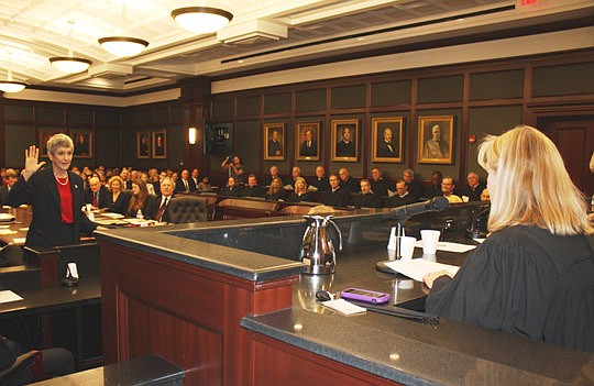 Photos by Joe Wilhelm Jr. - Circuit Judge Suzanne Bass was ceremonially sworn in by Circuit Judge Mallory Cooper on Thursday at the Duval County Courthouse.