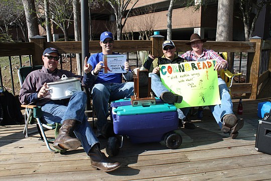 Photo by Joe Wilhelm Jr. - From left, Bert Ralston, Frank Morreale, Reed Nelson and Dr. Mark Eaton competed as team Cornbread on March 2 in the third annual The Jacksonville Bar Association Young Lawyers Section Charity Chili Cook-Off at Florida Coast...