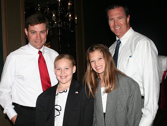From left, Rick Kane and his daughter Addyson, 10, with Hayden Webb, 10, and her father, Jesse, at the Spring Daddy Daughter Dance hosted by Girls Inc. of Jacksonville. More than 800 fathers and daughters attended the event Feb. 23 at the Hyatt Downto...