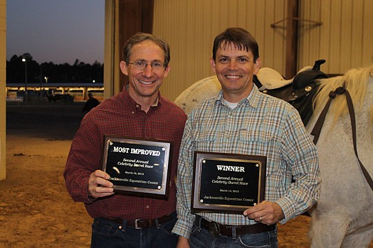 Photos by the Daily Record - City Council member Richard Clark (above, right) took first place and Supervisor of Elections Jerry Holland (above, left) earned the "Most Improved" distinction Thursday at the 2nd Annual Celebrity Barrel Race at the Eques...