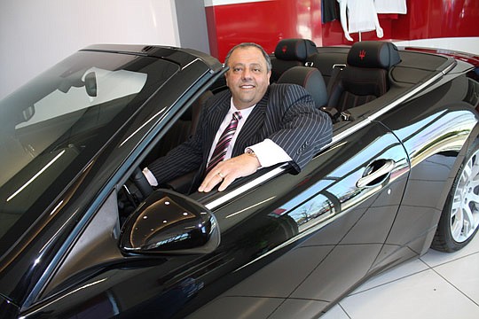 Photo by Joe Wilhelm Jr. - Jack Hanania, owner of Hanania Automotive Group, sits in a 2013 Maserati GranTurismo Convertible at Maserati of Jacksonville on Blanding Boulevard. Hanania was the awarded the only Maserati dealership between Orlando and Atl...