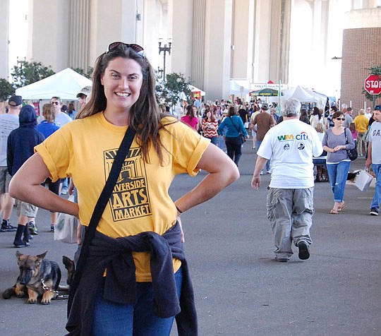 Photos by Laura Jane Pittman - Krysten Bennett, Riverside Arts Market director, spends most Saturdays under the Fuller Warren Bridge marketing and ensuring the well-attended event operates efficiently. On a recent Saturday, her duties included showing...