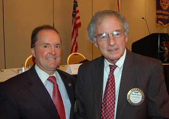 Photos by Max Marbut - From left, Rotary Club of Jacksonville member Sean Mulholland and attorney and club member Hank Coxe, who was the club's keynote speaker Monday.