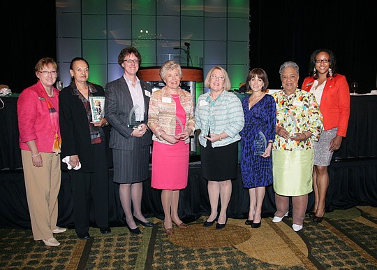 Girl Scouts of Gateway Council honored the 2013 Women of Distinction on Thursday at the Hyatt Downtown. From left are Sandra "Sam" Tysver, who is retiring as CEO of the council; honorees Rita Perry, publisher of the Jacksonville Free Press; Cindy Sanb...