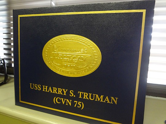 Photos by David Chapman - A memento commemorating his trip to the USS Truman for an overnight stay after an invitation from Victor Guillory, City Military Affairs, Veterans and Disabled Services Department director. "That was one incredible experience...