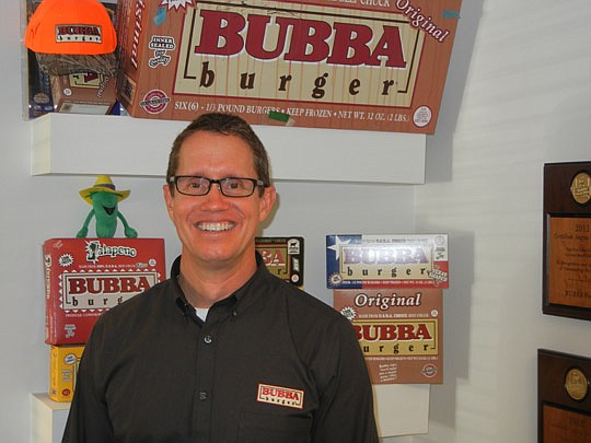Photo by Karen Brune Mathis - Andy Stenson, vice president of marketing and business development for Hickory Foods Inc., which manages the BUBBA burger brand and Peterbrooke Chocolatier.