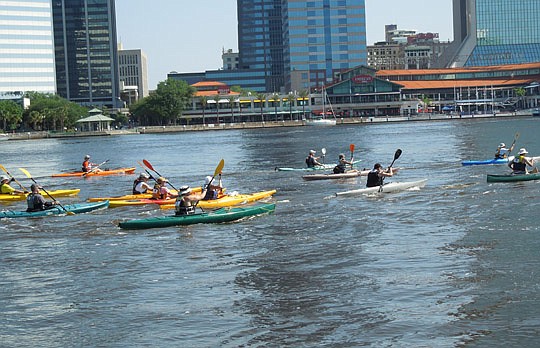 The 2013 River City Challenge combines paddle racing, a trade show, a film festival and a music festival to benefit local organizations that support the St. Johns River.