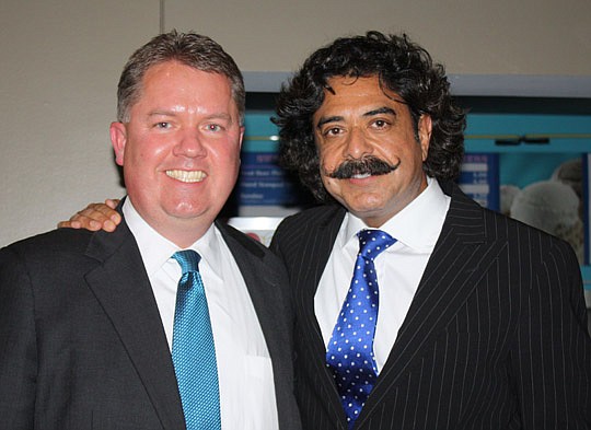 Photo by Joe Wilhelm Jr. - The Jacksonville Bar Association President Ray Driver and Jacksonville Jaguars owner Shad Khan at the association's Law Day Luncheon on Thursday at the West Touchdown Club at EverBank Field. Khan was the keynote speaker.