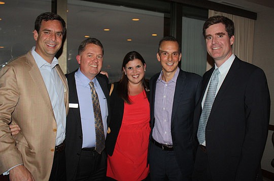 Photo by Joe Wilhelm Jr. - From left, Craig Camp of Merrill Lynch; Ray Driver of Driver McAfee; Lindsay Tygart of Edwards &amp; Ragatz; U.S. Anti-doping Agency CEO Travis Tygart; and Gray Camp of Merrill Lynch Lindsay and Travis  Tygart are siblings.