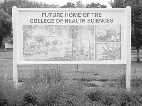 A sign on the Jacksonville University campus shows the site of the College of Health Sciences.