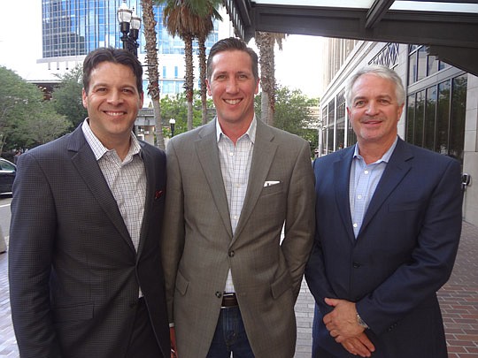 Photo by David Chapman - Fraser Burns, Chad Munsey and Jacques Klempf, the ownership group of Ovinte, were identified as the ownership group under contract for the Bostwick Building.