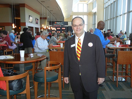Photos by Karen Brune Mathis - Jacksonville Community Council Inc. President and CEO Ben Warner greeted the estimated 350 people who attended the release of the JAX2025 vision report Saturday at the EverBank Field West Touchdown Club.