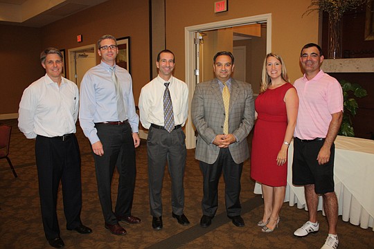 Photos by Joe Wilhelm Jr. - Members of The Jacksonville Bar Association elected (from left) Geddes Anderson, Lee Wedekind, Blane McCarthy, Michael Bateh, Katie Dearing and 2013-14 President Braxton Gillam to the board of directors. Troy Smith (not pic...