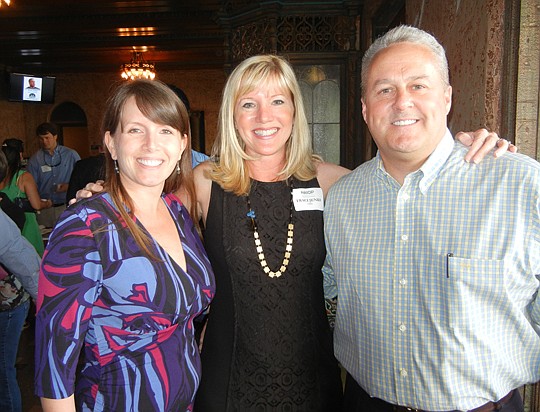 Florida Theatre Director of Development Angela Gieras with NAIOP Northeast Florida Chapter President Traci Jenks, a senior associate with CBRE, and former NAIOP President Gordon Steadman, vice president of development at Elkins Constructors Inc. The N...