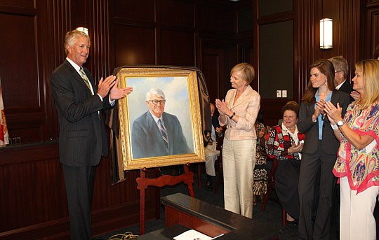 The family of Ed Austin unveiled his portrait during a ceremony Wednesday at the Duval County Courthouse. Ed Austin served as the first public defender in the area and later as State Attorney and mayor. His portrait will hang near the entrance to Cour...
