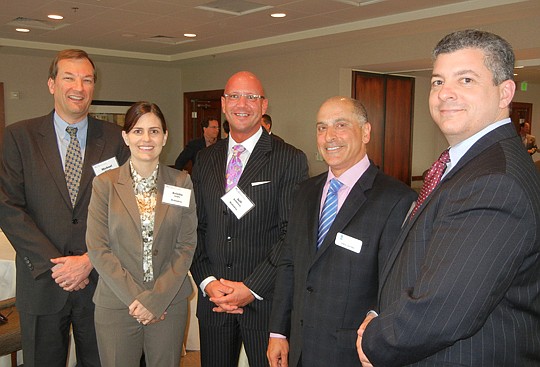 From left, Association for Corporate Growth North Florida Chapter President Michael Kirwan, a partner with the Foley &amp; Lardner law firm, with McGladrey tax executives Kristie Angle, Jeff Delle Fave, Greg DeVino and Louis Alvarez Jr.