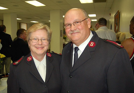 Photos by Max Marbut - Majs. Pam and Dean Hinson, Salvation Army of Northeast Florida area commanders, said goodbye Wednesday to staff and friends they made since they were transferred to Jacksonville. The Hinsons are moving in two weeks to their new ...