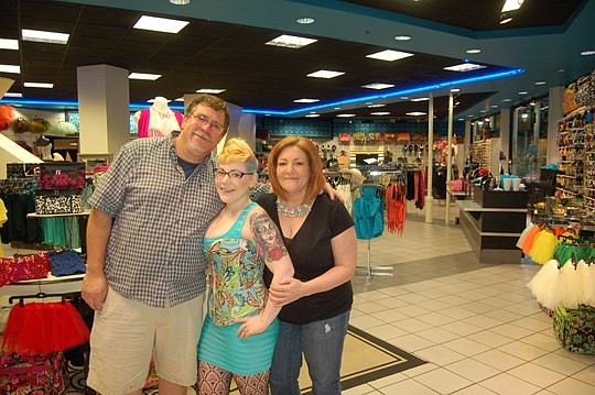 Tom Hand, Carlisle Brunswick and Carolyn Hand in the Frugal Diva Subculture Corset Collection at the Landing.