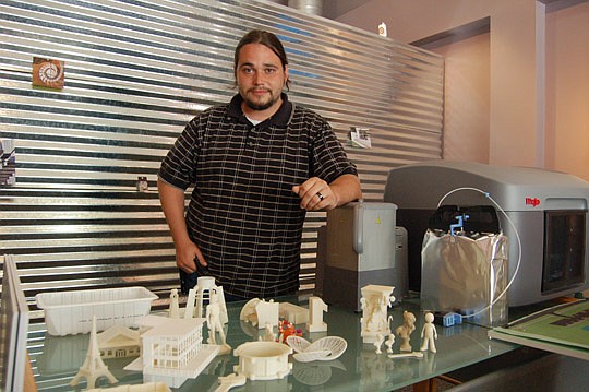 Photos by Max Marbut - James Miller, architectural craftsman at JAA Architecture Inc., fabricates scale models with a 3-D printer.