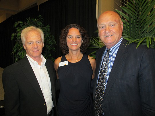 Photo by Deborah Metzig - Jim Doyle, chair of Northeast Florida Builders Association Sales and Marketing Council, with Carole Zingone, president of the Northeast Florida Association of Realtors, and John Tuccillo, chief economist for the Florida Realtors.