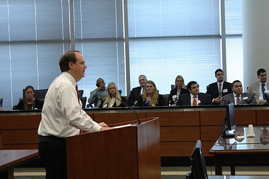 Photos by Joe Wilhelm Jr. - U.S. District Judge Timothy Corrigan talks about ethics and professionalism in the practice of law Thursday during The Jacksonville Bar Association Young Lawyers Section's "Noon in June" program, which introduces summer int...