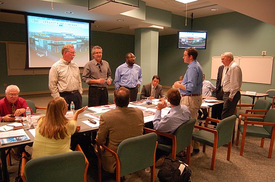 Photos by Max Marbut - Members of the City Downtown Development Review Board conducted a design workshop Monday with architects and engineers on the Brooklyn Riverside Retail Project. The site plan includes a grocery store, pharmacy and restaurants.