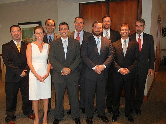 Photos by Karen Brune Mathis - (from left) President Jason Burgess; Secretary Katie Fackler; director John Freeman; director James Eidson; director Douglas Neway; Vice President Robert Heekin Jr.; Treasurer Kevin Paysinger; director Mark Mitchell; and...