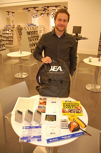 File photo by Max Marbut - JEA Conservation and Efficiency Specialist David Reed with the Home Energy Evaluation kit, which is available at Jacksonville Public Libraries.