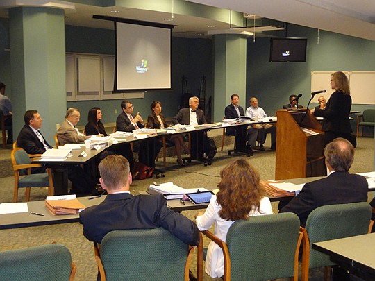 Photo by David Chapman - Members of the Jacksonville Retirement Task Force hear about Sunshine Law compliance from Alexis Lambert, City Office of Public Accountability manager, during Wednesday's meeting. The group has plans for two more meetings and ...