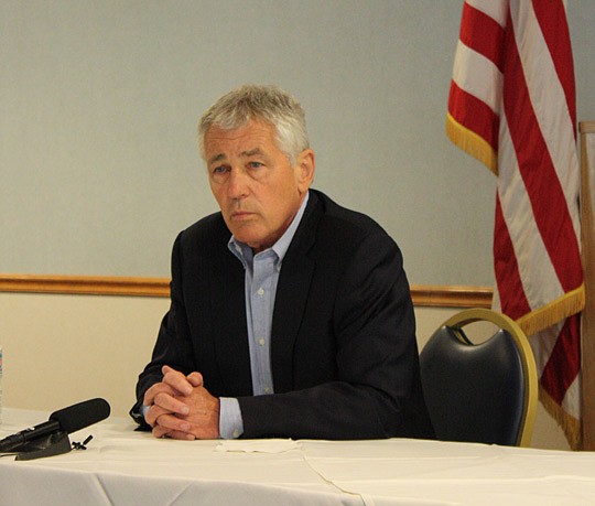 Photos by Joe Wilhelm Jr. - Secretary of Defense Chuck Hagel (right) visited Naval Air Station Jacksonville Tuesday with a warning that continued sequestration into the next fiscal year would mean a Department of Defense budget cut.