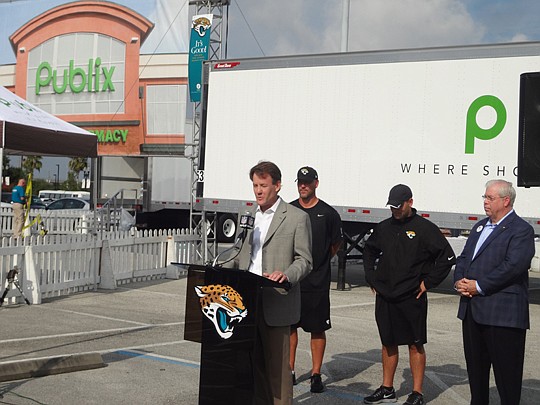 Photo by David Chapman - Scott Massey, Jacksonville Jaguars senior vice president of corporate partnerships, discusses details of a five-year partnership with Publix Super Markets Inc. The partnership was announced Saturday outside EverBank Field.