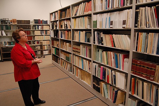 Photos by Max Marbut - Kathleen Krizek, special collections senior librarian, in the Federal Depository Library program area at the Main Library.
