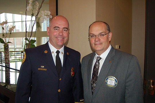Jacksonville Fire and Rescue Department Director and Chief Marty Senterfitt and Ben Warner, president and CEO of Jacksonville Community Council Inc.