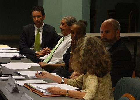 Photo by David Chapman - From left, Downtown Investment Authority board Chair Oliver Barakat, Vice Chair Jim Bailey and members Kay Harris and Tony Allegretti listen to board member Melody Bishop discuss the need for an increase in the authority's ope...