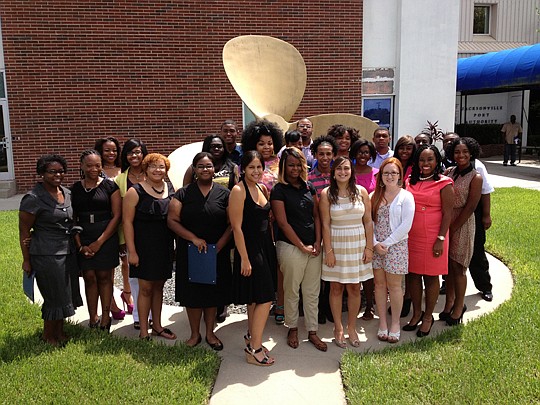 The International Longshoremen's Association Local 1408 presented $45,000 in scholarships to more than 30 high school seniors and college students (some of both groups pictured above) during an awards ceremony at the Jacksonville Port Authority. Stude...