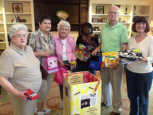 Camellia at Deerwood, a senior lifestyle community in South Jacksonville, is hosting a school-supply drive for students attending the MaliVai Washington Youth Foundation's after-school program. The drive continues through Sept. 30. Pictured from left,...