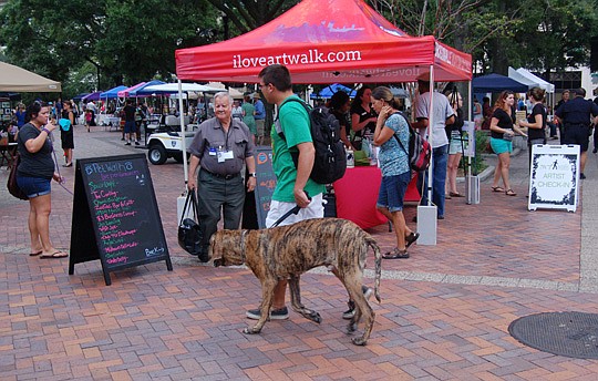 Photo by Max Marbut - September's Art Walk is traditionally themed "Pet Walk." More dogs than usual brought their people to the Downtown event Wednesday.