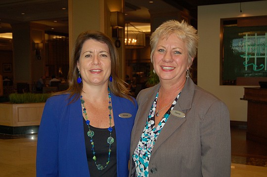 Photo by Max Marbut - Melissa Milione, Hyatt Downtown senior director of catering and convention services, and Dianne Liberty, senior convention services manager.